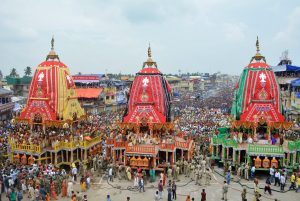 Puri: Devotees pull the chariots during the 141st Rath Yatra, in Puri on Saturday, July 14, 2018. The yatra is taken out every year on Ashadhi Bij, the second day of Ashad month, as per the Hindu calender. Besides the three chariots of Lord Jagannath, his brother Balram and sister Subhadra, the yatra procession comprises of 18 decorated elephants, 101 trucks with tableaux, members of 30 religious groups and 18 singing troupes. (PTI Photo)(PTI7_14_2018_000073B)