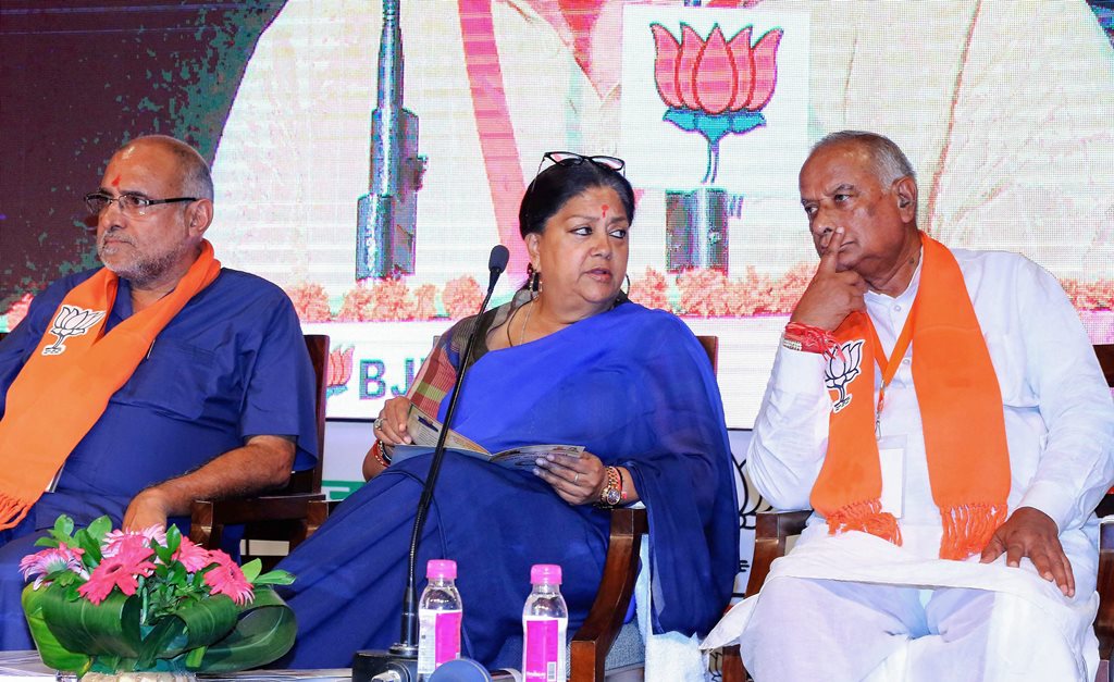 Jaipur: Rajasthan Chief Minister Vasundhara Raje and BJP state President Madanlal Saini attend the two days state working committee meeting, in Jaipur on Friday, July 20, 2018. (PTI Photo)(PTI7_20_2018_000235B)