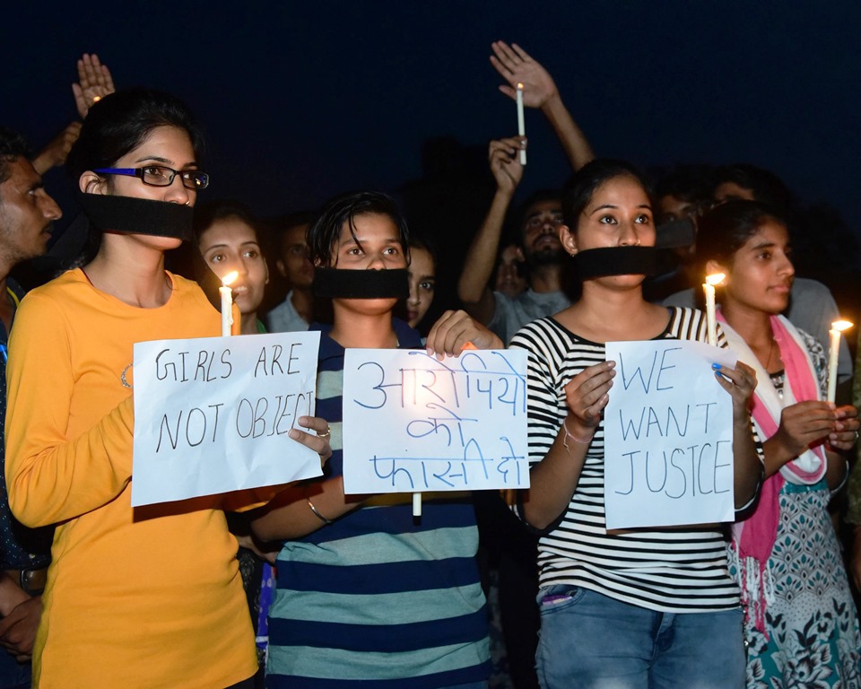 Bikaner:Youth take part in a candle march in protest against the rape of an eight-year-old girl in Mandsaur, at Bikaner on Saturday,June 