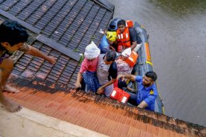 Kottayam : Rescue teams evacuate people from flood affected areas, to relief camps at Kottayam district in Kerala, on Monday, Aug. 20, 2018. (PTI Photo/Coast Guard)(PTI8_20_2018_000096B)
