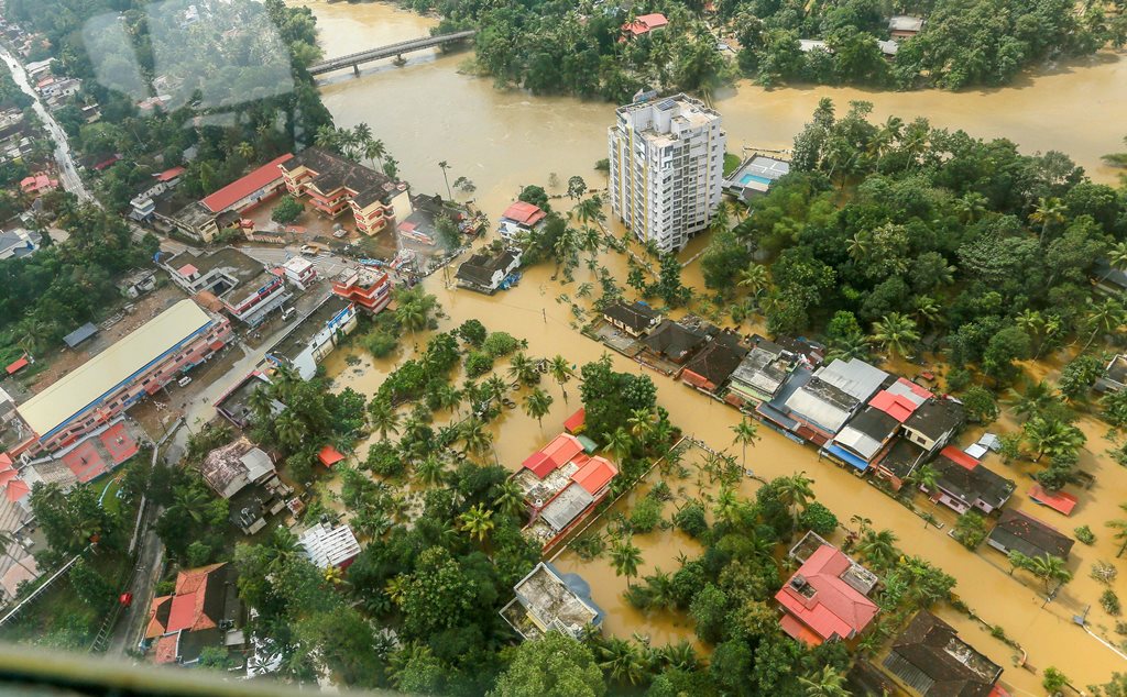 Chengannur: Flood affected areas of Chengannur seen from a Indian Navy helicopter, at Alappuzha district of the Kerala, on Sunday August 19, 2018. (PTI Photo) (PTI8_20_2018_000097B)