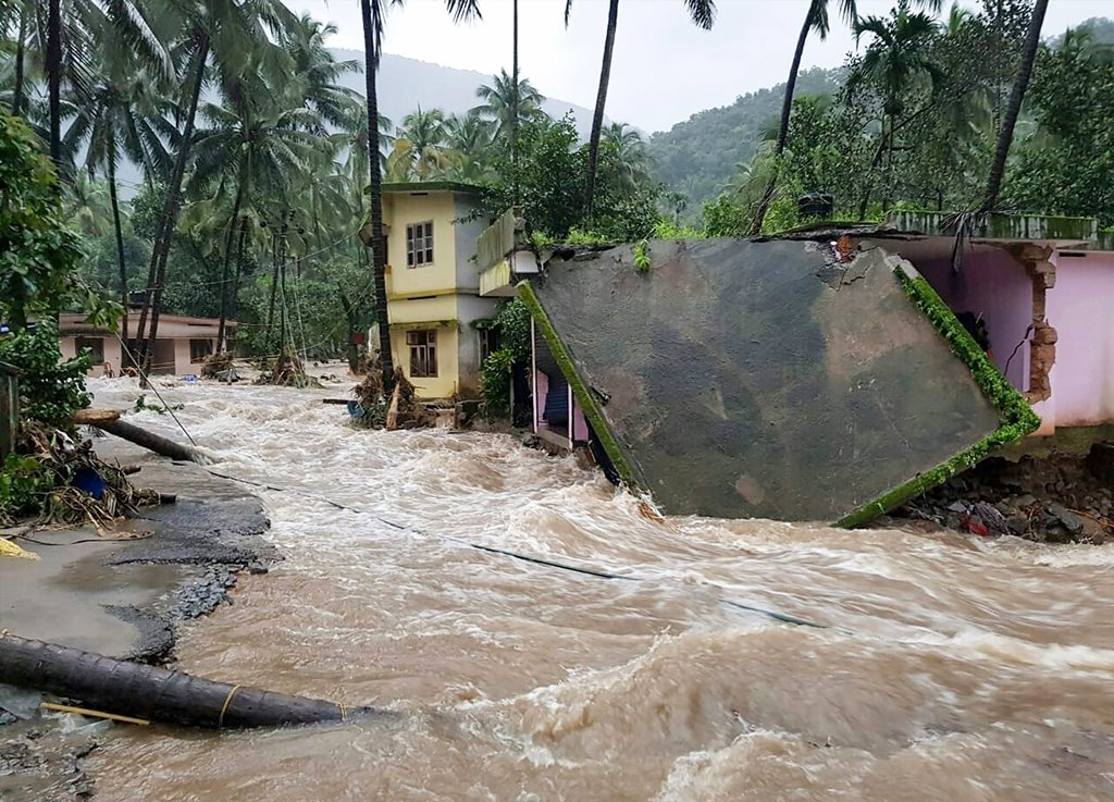 Kozhikode: Roof of a house collapses following a flash flood, triggered by heavy rains, at Kodencheri in Kozhikode district of Kerala on Thursday, Aug 9, 2018. (PTI Photo)(PTI8_9_2018_000230B)