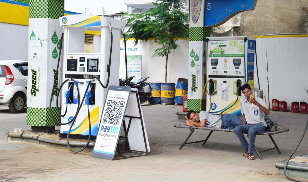 Beawar: Petrol pump attendants sit idle during the Bharat Bandh, called by the upper-caste organisations in protest over the recent amendment of the SC/ST Act, in Beawar, Thursday, Sept 6, 2018. (PTI Photo) (PTI9_6_2018_000093B)
