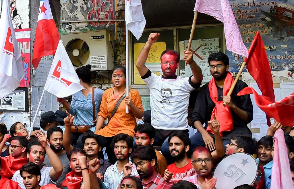New Delhi: Members of Left Unity celebrate after their sucess in Jawaharlal Nehru University Student Union (JNUSU) elections, in New Delhi, Sunday, Sept 16, 2018. (PTI Photo) (PTI9_16_2018_000091B)