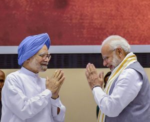 New Delhi: Prime Minister Narendra Modi and former prime minister Manmohan Singh during a release of the book titled "Moving On...Moving Forward: A Year in Office" published on experiences of M Venkaiah Naidu during his first year as Vice President of India and Chairman of Rajya Sabha, in New Delhi on Sunday, Sept 2, 2018. (PTI Photo/Kamal Singh)(PTI9_2_2018_000057B)