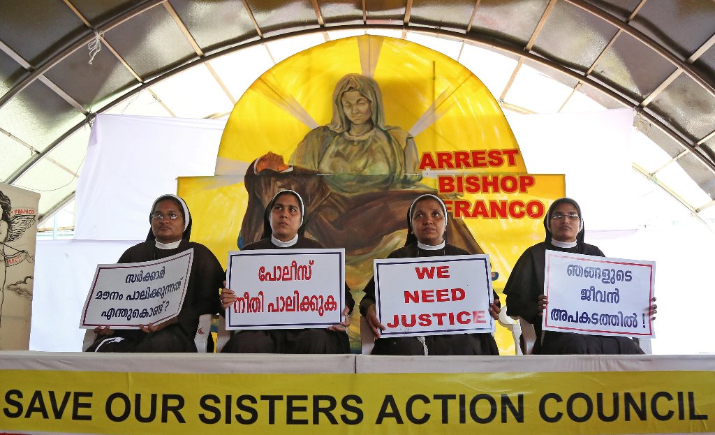 Nuns hold placards during a protest demanding justice after an alleged sexual assault of a nun by a bishop in Kochi, in the southern state of Kerala, India, September 13, 2018. The placards read in Malayalam "Why is the government silent?', 'Police, do justice', and "Our lives are threatened'. REUTERS/Sivaram V
