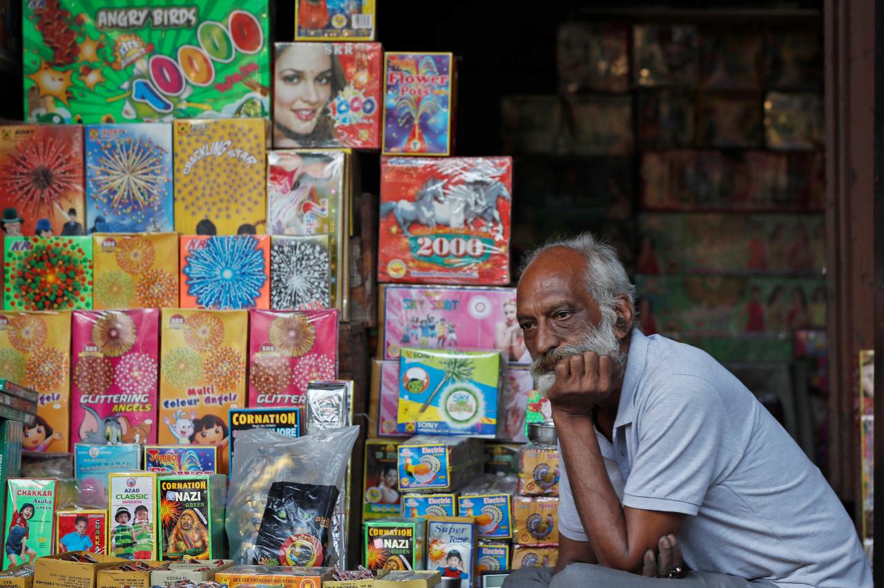 A shopkeeper waits for customers at his firecracker shop in the old quarters of Delhi, India, October 17, 2018. REUTERS/Adnan Abidi