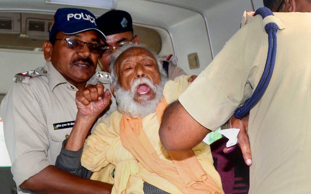 Haridwar: Environmentalist G D Agarwal, who has been fasting for over 100 days for a clean River Ganga, being forcibly taken to the hospital after his health detriorated in Haridwar, Wednesday, Oct 10, 2018. (PTI Photo) (PTI10_10_2018_000143B)