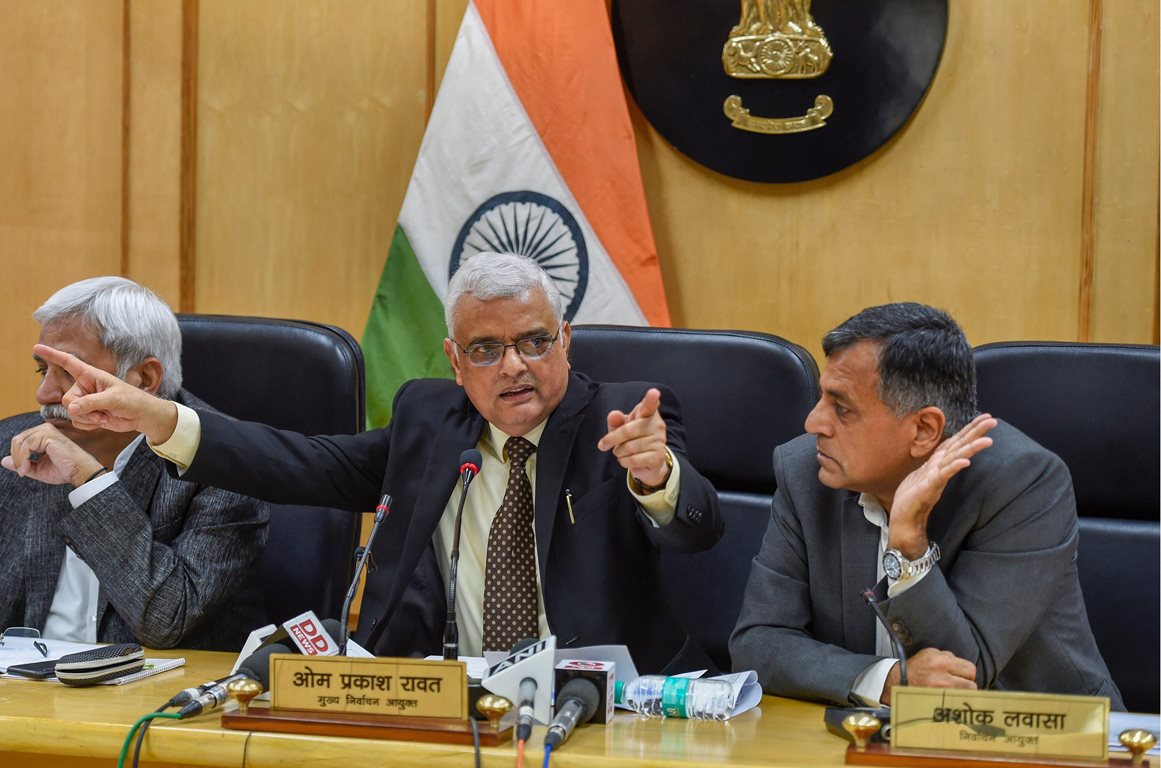 New Delhi: Chief Election Commissioner OP Rawat flanked by Election Commissioners Sunil Arora (L) and Ashok Lavasa (R) address a press conference to announce the dates for Assembly elections in five states, in Delhi, Saturday, Oct 6,2018. ( PTI Photo/ Kamal Singh) (PTI10_6_2018_000093A)