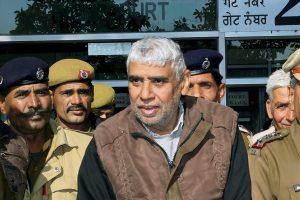 **FILE** Chandigarh: In this file photo dated Dec 23, 2014, is seen self-proclaimed godman Rampal being produced in Punjab & Haryana High Court in Chandigarh. Rampal and 27 of his followers on Thursday, Oct 11, 2018, were charged with murder and wrongful confinement after four women and a child were found dead in his Satlok Ashram in Barwala town in Hisar on November 19, 2014. (PTI Photo) (PTI10_11_2018_000067B)