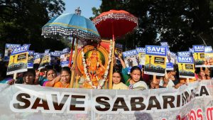 New Delhi: Lord Ayyappa devotees take part in the 'Ayyappa Namajapa Yatra' (chanting the name of Lord Ayyappa) in New Delhi, Sunday, October 14, 2018 against the Supreme Court verdict on the entry of women of all ages into the Sabarimala Lord Ayyappa Temple. (PTI Photo/Shahbaz Khan) (PTI10_14_2018_000087B)