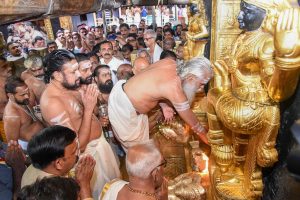 Sabarimala: Melsanthi Unnikrishnan Nampoothiri opens the Sabarimala temple for the five-day monthly pooja in the Malayalam month of ‘Thulam’, Sabarimala, Wednesday, Oct. 17, 2018. Tension was witnessed outside Sabarimala temple that was opened for the first time for women between the age of 10 and 50 on Wednesday following the Supreme Court verdict, turning over the age-old custom of not admitting them. (PTI Photo) (PTI10_17_2018_000155B)
