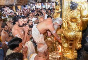 Sabarimala: Melsanthi Unnikrishnan Nampoothiri opens the Sabarimala temple for the five-day monthly pooja in the Malayalam month of ‘Thulam’, Sabarimala, Wednesday, Oct. 17, 2018. Tension was witnessed outside Sabarimala temple that was opened for the first time for women between the age of 10 and 50 on Wednesday following the Supreme Court verdict, turning over the age-old custom of not admitting them. (PTI Photo) (PTI10_17_2018_000155B)