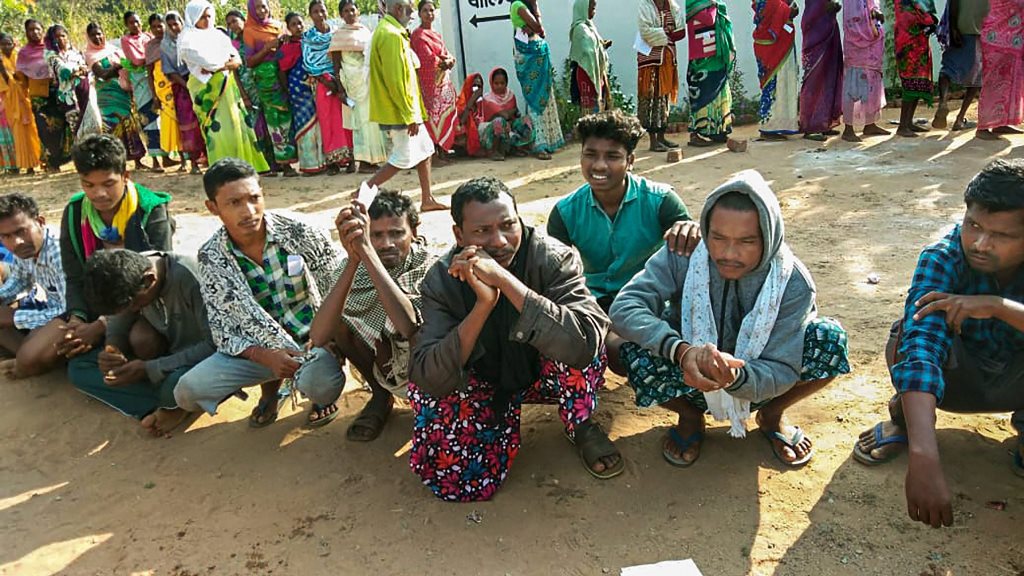 ** BEST QUALITY AVAILABLE** voters wait in queues to cast their votes during the first phase of Assembly elections in Chhattisgarh at a polling station in Dantewada on Monday, Nov 12,2018.( PTI Photo)(PTI11_12_2018_000003)