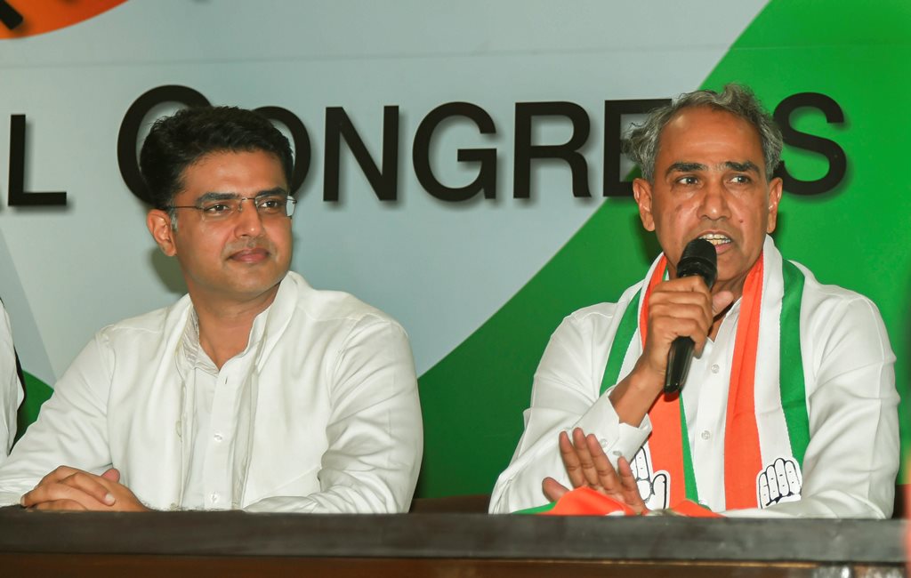 New Delhi: Dausa MP Harish Chandra Meena speaks at a press conference after joining the Congress party, at AICC headquarters in New Delhi, Wednesday, Nov 14, 2018. Rajasthan Congress chief Sachin Pilot is also seen. (PTI Photo/Subhav Shukla) (PTI11_14_2018_000097)