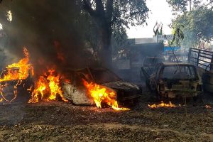 Bulandshahr: Vehicles set on fire by a mob during a protest over the alleged illegal slaughter of cattle, in Bulandshahr, Monday, Dec. 03, 2018. According to Additional Director General of Meerut zone Prashant Kumar, protesters from Mahaw village and nearby areas pelted stones on the police and indulged in arson setting several vehicles and the Chingarwathi Police Chowki on fire. (PTI Photo) (PTI12_3_2018_000175B)