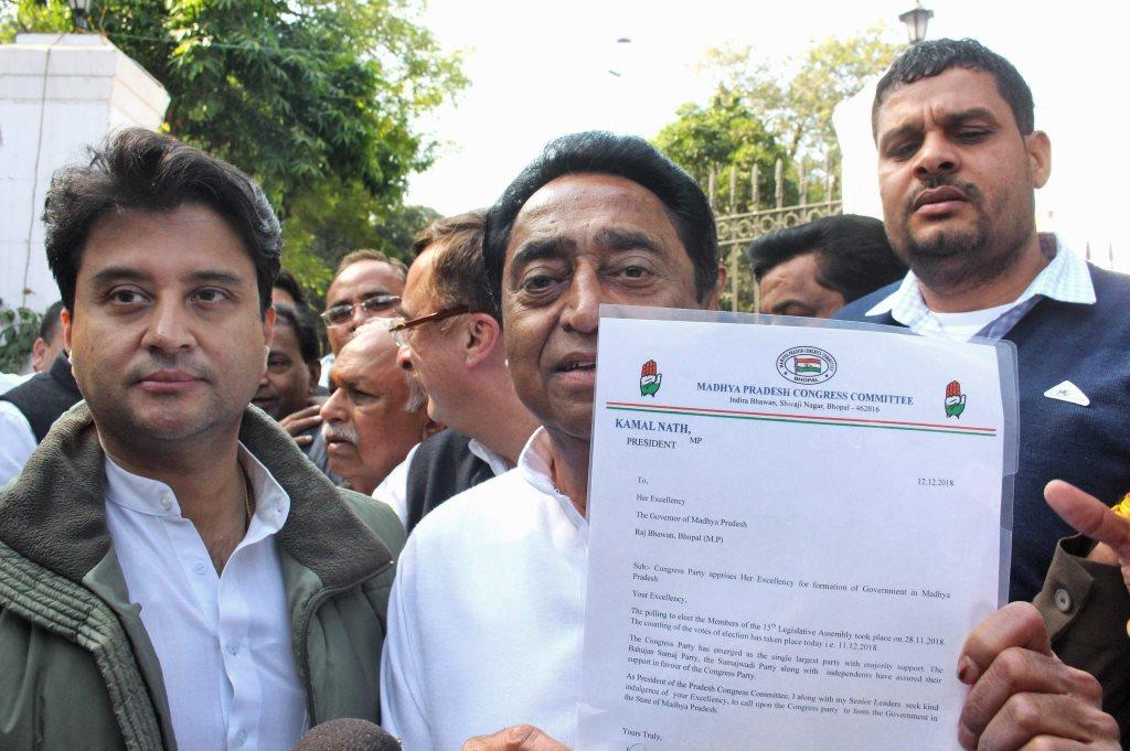 Bhopal: Congress State President Kamal Nath, party leader Jyotiraditya Scindia and other leaders leave after a meeting with Governor Anandiben Patel to stake claim to form the government at Raj Bhawan, in Bhopal, Wednesday, Dec. 12, 2018. (PTI Photo)
