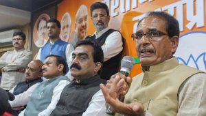 Bhopal: Madhya Pradesh Chief Minister Shivraj Singh Chouhan addresses a press conference, at BJP State headquarters in Bhopal, Wednesday, Dec. 12, 2018. BJP State President Rakesh Singh is also seen.(PTI Photo)(PTI12_12_2018_000200)