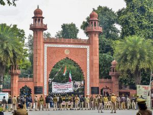 Aligarh: Police personnel deployed on the campus of Aligarh Muslim University in the view of protests after some students were booked on alleged sedition charges, in Aligarh, Friday, Feb 15, 2019. (PTI Photo) (PTI2_15_2019_000168B)