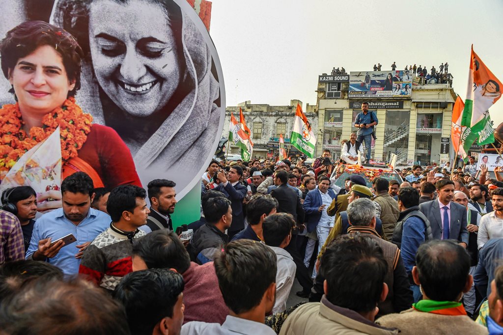 Lucknow: A hoarding with the picture of Congress General Secretary Priyanka Gandhi Vadra along with her grandmother, former prime minister Indira Gandhi during her roadshow in Lucknow, Monday, Feb. 11, 2019. (PTI Photo/Atul Yadav) (PTI2_11_2019_000229B)