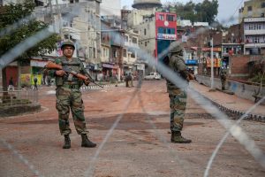 Jammu: Army personnel stand guard at Gujjar Nagar area during a curfew, imposed on the third day after the clash between two communities over the protest against the Pulwama terror attack, in Jammu, Sunday, Feb. 17, 2019. (PTI Photo)(PTI2_17_2019_000035B)