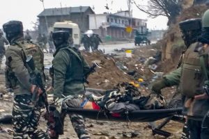 *BEST QUALITY AVAILABLE* Awantipora: Jawans carry a victim after militants attacked a CRPF convoy in Goripora area of Awantipora town in Pulwama district, Thursday, Feb 14, 2019. At least 18 CRPF jawans were reportedly killed in the attack. (PTI Photo) (PTI2_14_2019_000126B)