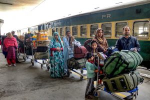 Attari: Passengers, arriving from Pakistan by Samjhauta Express train, wait for custom-check at Attari railway station, near Amritsar, Monday, Feb 25, 2019. (PTI Photo) (PTI2_25_2019_000137B)