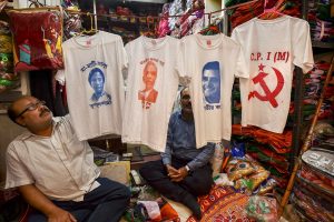 Kolkata: A shopkeeper displays T-shirts with portraits of politicians printed on them, ahead of the Lok Sabha polls, in Kolkata, Thursday, March 14, 2019. (PTI Photo/Swapan Mahapatra)(PTI3_14_2019_000108B)