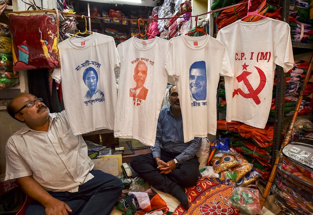 Kolkata: A shopkeeper displays T-shirts with portraits of politicians printed on them, ahead of the Lok Sabha polls, in Kolkata, Thursday, March 14, 2019. (PTI Photo/Swapan Mahapatra)(PTI3_14_2019_000108B)