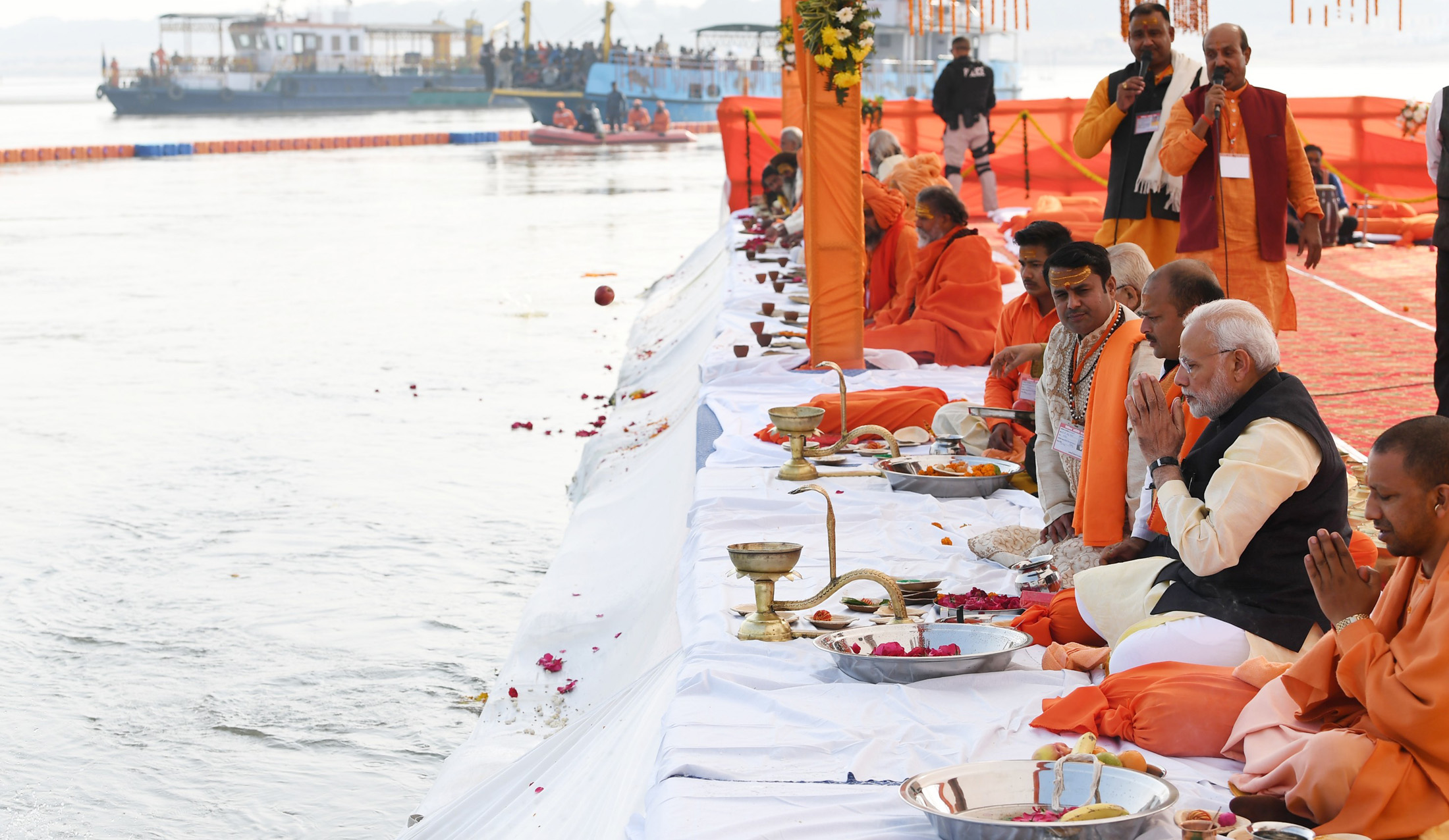 The Prime Minister, Shri Narendra Modi performing the Ganga Pujan, at Prayagraj, in Uttar Pradesh on December 16, 2018. The Chief Minister of Uttar Pradesh, Shri Yogi Adityanath is also seen.