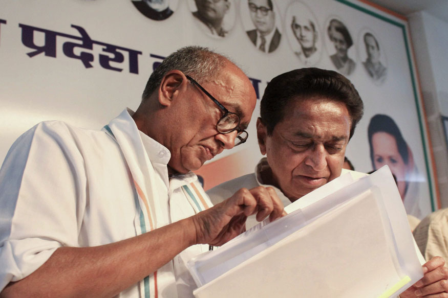 Bhopal: AICC General Secretary Digvijay Singh and Congress state President Kamal Nath at a joint press conference in Bhopal, on Thursday. (PTI Photo) (PTI5_24_2018_000101B)