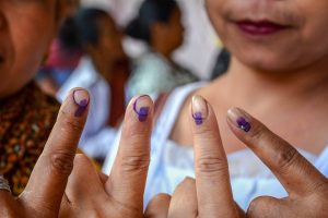 Ri-Bhoi: Women voters show their fingers marked with indelible ink after casting vote during the first phase of the general elections, at Umpher in Ri-Bhoi district, Thursday, April 11, 2019. (PTI Photo)(PTI4_11_2019_000041B)