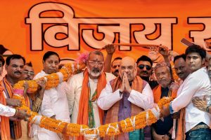 Begusarai: BJP President Amit Shah being garlanded by the party workers during an election campaign rally ahead of the Lok Sabha polls, in Begusarai district, Wednesday, April 24, 2019. (PTI Photo) (PTI4_24_2019_000051B)