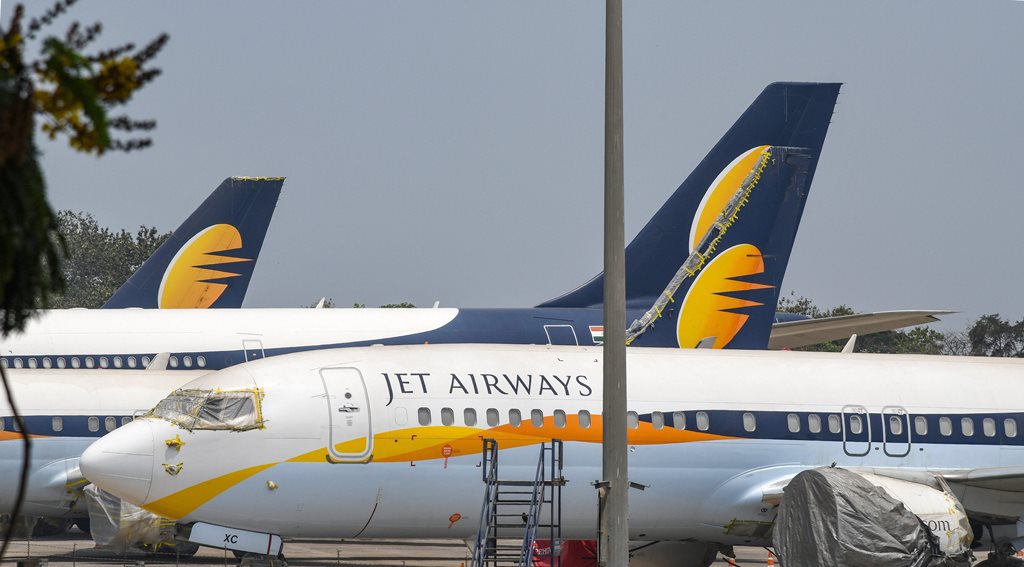 Mumbai: A view of Jet Airways planes parked at the Mumbai airport, Monday, April 15, 2019. The airline is operating just 6-7 planes, with almost its entire fleet being grounded due to non-payment of rentals to lessors amid severe paucity of cash. (PTI Photo/Shirish Shete)(PTI4_15_2019_000046B)