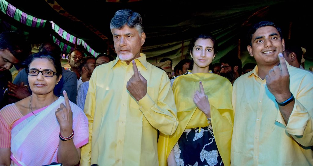 Amaravati: TDP President and Andhra Pradesh Chief Minister N Chandrababu Naidu and his family members show their finger marked with indelible ink after casting vote during the first phase of the general elections, in Amaravati, Thursday, April 11, 2019. (PTI Photo)(PTI4_11_2019_000133B)