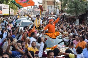 Gorakhpur: BJP candidate from Gorakhpur constituency Ravi Kishan raises slogans at his roadshow for Lok Sabha polls, in Gorakhpur, Thursday, April 18, 2019. (PTI Photo) (PTI4_18_2019_000264B)