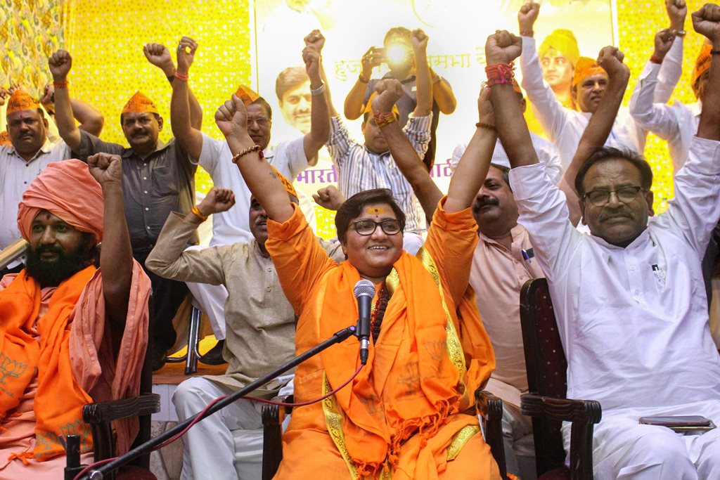 Bhopal: BJP candidate Sadhvi Pragya Singh Thakur gestures while addressing a party workers' meeting for Lok Sabha polls, in Bhopal, Thursday, April 18, 2019. (PTI Photo) (PTI4_18_2019_000258B)
