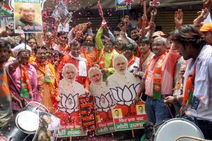 Varanasi: BJP workers celebrate party's lead in the Lok Sabha elections 2019, in Varanasi, Thursday, May 23, 2019. (PTI Photo) (PTI5_23_2019_000087B)