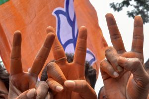 Kolkata: BJP supporters show victory sign as they celecbrate their party's lead in the Lok Sabha elections, at BJP office, in Kolkata, Thursday, May 23, 2019. (PTI Photo/Ashok Bhaumik) (PTI5_23_2019_000073B)