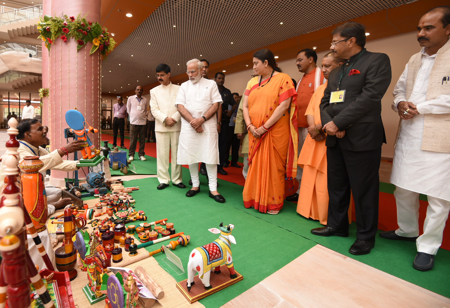 The Prime Minister, Shri Narendra Modi meets the artisans and weavers, at the Deendayal Hastkala Sankul, Varanasi, Uttar Pradesh on September 22, 2017. The Union Minister for Textiles and Information & Broadcasting, Smt. Smriti Irani, the Chief Minister, Uttar Pradesh, Yogi Adityanath, the Minister of State for Textiles, Shri Ajay Tamta and the Deputy Chief Minister, Uttar Pradesh, Shri Keshav Prasad Maurya are also seen.
