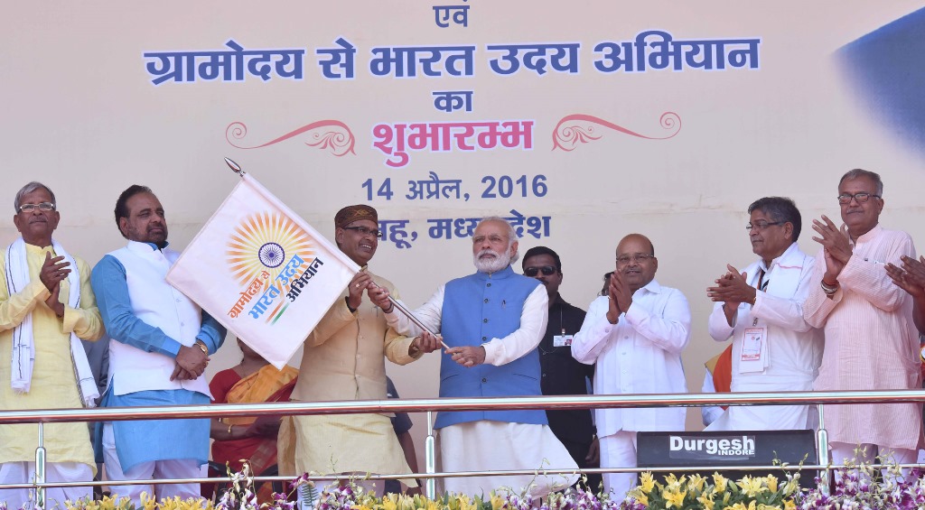 The Prime Minister, Shri Narendra Modi launching the “Gram Uday se Bharat Uday” Abhiyan, in Mhow, Madhya Pradesh on April 14, 2016. The Union Minister for Social Justice and Empowerment, Shri Thaawar Chand Gehlot, the Chief Minister of Madhya Pradesh, Shri Shivraj Singh Chouhan and other dignitaries are also seen.