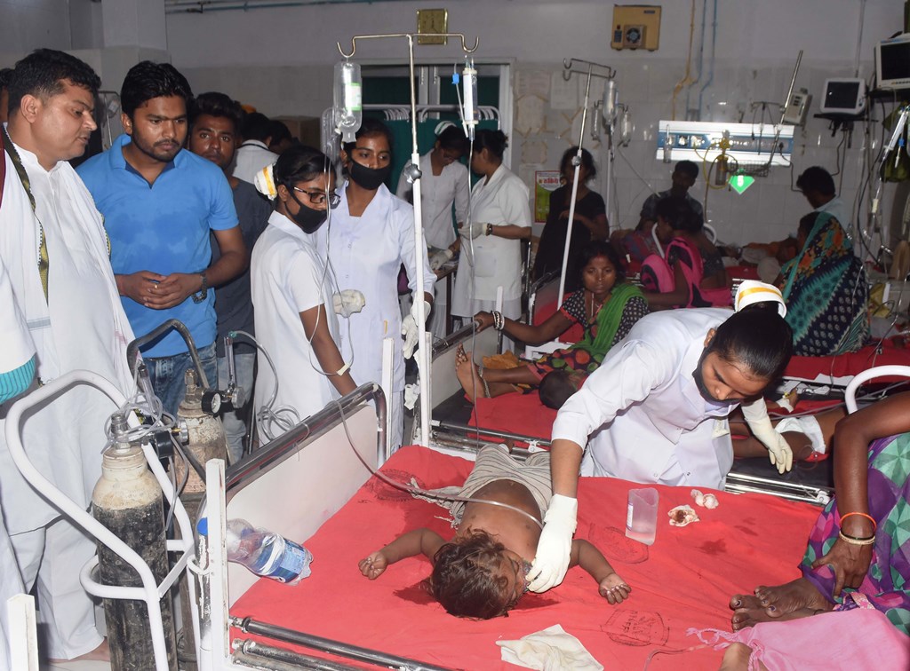 Muzaffarpur: Children showing symptoms of Acute Encephalitis Syndrome (AES) being treated at a hospital in Muzaffarpur, Saturday, June 15, 2019. Four more children died Friday in Bihar's Muzaffarpur district reeling under an outbreak of brain fever, taking the toll to 57 this month (PTI Photo)(PTI6_15_2019_000044B)