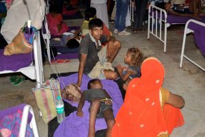 Muzaffarpur: A view of an over-crowded ward with children showing symptoms of Acute Encephalitis Syndrome (AES) as they undergo treatment at a hospital, in Muzaffarpur, Monday, June 17, 2019. The death toll rose to 100 in Muzaffarpur and the adjoining districts in Bihar. (PTI Photo) (PTI6_17_2019_000139B)