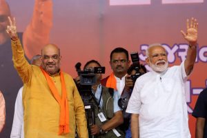 Ahmedabad: Prime Minister Narendra Modi with BJP President Amit Shah during a public meeting at the BJP office in Ahmedabad, Sunday, May 26, 2019, after the victory in the recent Lok Sabha elections. (PTI Photo) (PTI5_26_2019_000108B)