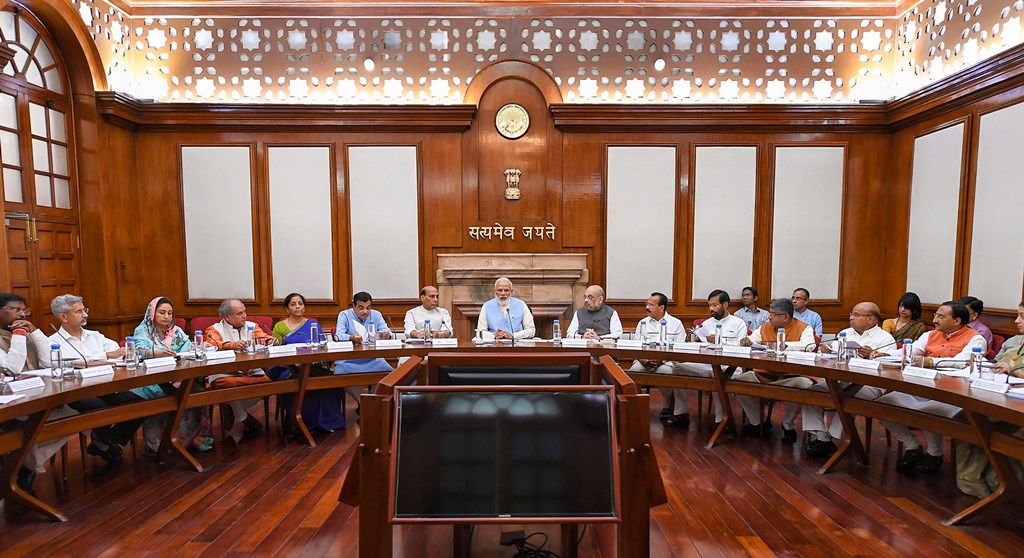 New Delhi: Prime Minister Narendra Modi with Union Ministers Nitin Gadkari, Rajnath Singh, Amit Shah, Nirmala Sitharaman and others during the first cabinet meeting, at the Prime Minister’s Office, in South Block, New Delhi, May 31, 2019. (PTI Photo)(PTI5_31_2019_000249B)