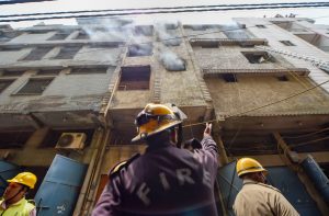 Delhi: Firefighters carry out rescue operation at a massive fire at a hardware factory in Jhilmil industrial area, in New Delhi, Saturday, July 13, 2019. Three people, including two women, were killed in the incident. (PTI Photo/Ravi Choudhary) (PTI7_13_2019_000065B)