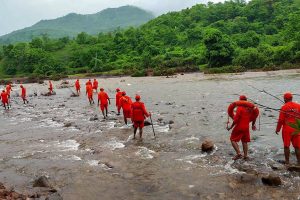 Ratnagiri: NDRF personnel conduct search operation for missing villagers, after Tiware dam breached following incessant rains, in Ratnagiri, Thursday, July 4, 2019. (PTI Photo) (PTI7_4_2019_000236B)