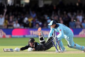London: England's Jos Buttler runs out New Zealand's Martin Guptill during the Super Over in the Cricket World Cup final match between England and New Zealand at Lord's cricket ground in London, England, Sunday, July 14, 2019. AP/PTI(PTI7_15_2019_000030B)