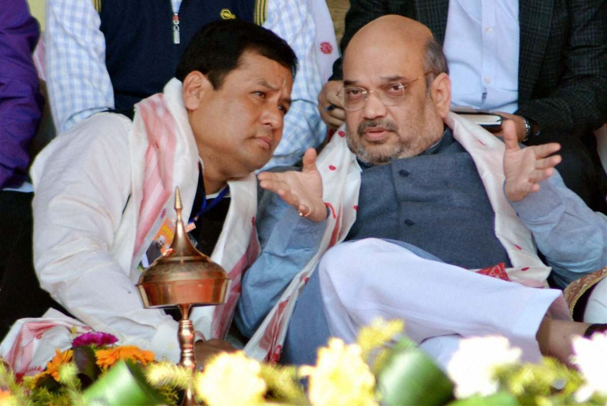 BJP national president Amit Shah with the party’s Assam president Sarbananda Sonowal during a party workers conference in Dibrugarh, Assam on Friday. Credit: PTI
