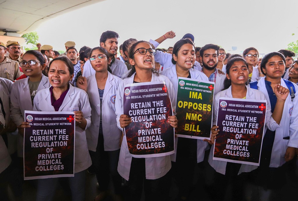 New Delhi: Doctors and medical students of AIIMS display placards during a strike to protest the introduction of the National Medical Commission (NMC) Bill in the Rajya Sabha, in New Delhi, Thursday, Aug 01, 2019. (PTI Photo)(PTI8_1_2019_000129B)